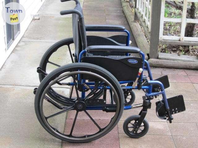 Photo of HIGH END BLUE INVACARE TORNADO WHEELCHAIR FOR SALE