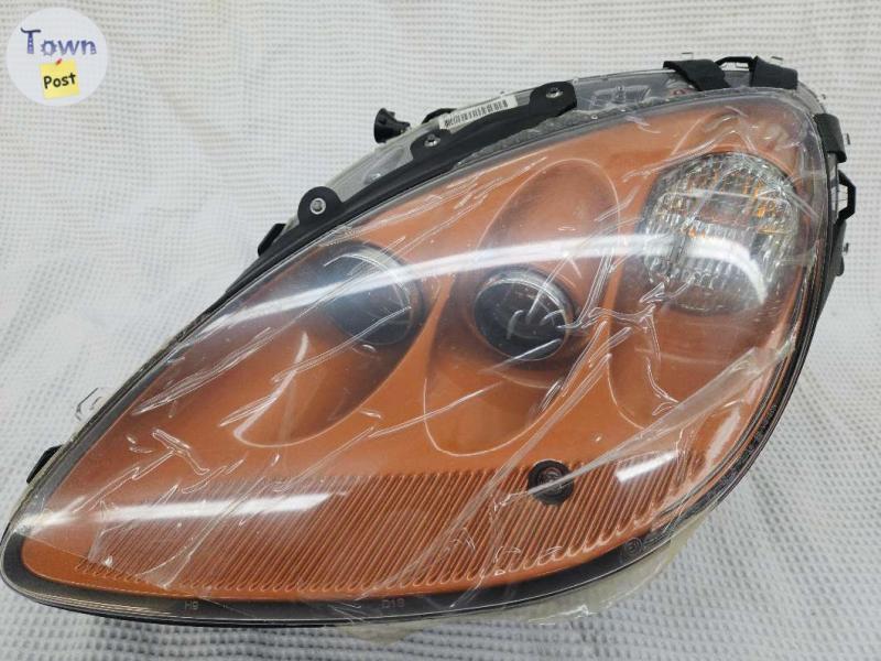 Photo of 2005-2013 Chevrolet Corvette Left Driver Side Atomic Orange Headlight OEM