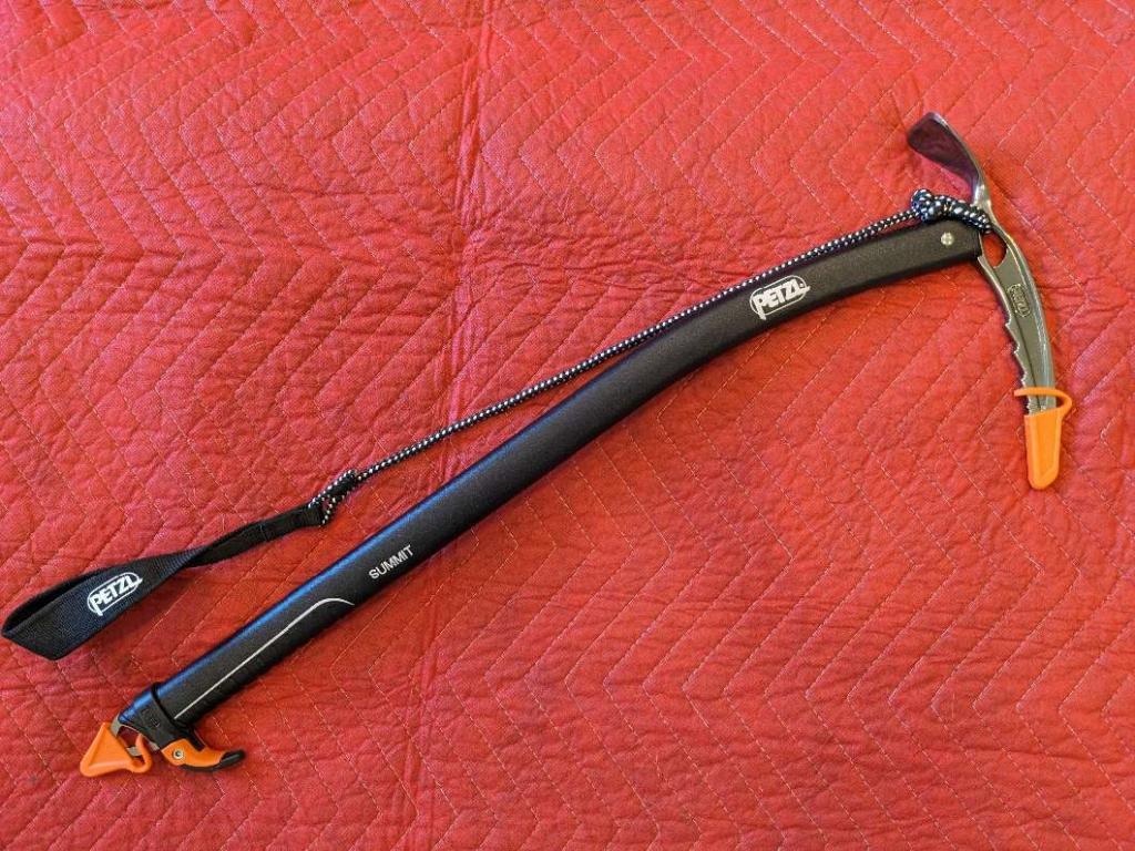 Photo of Petzl Summit mountaineering ice axe with accessories, new condition $150obo